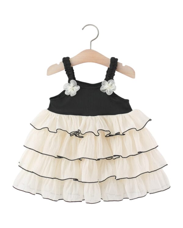 Βρεφικό φόρεμα μαύρο-κρεμ με βολάν