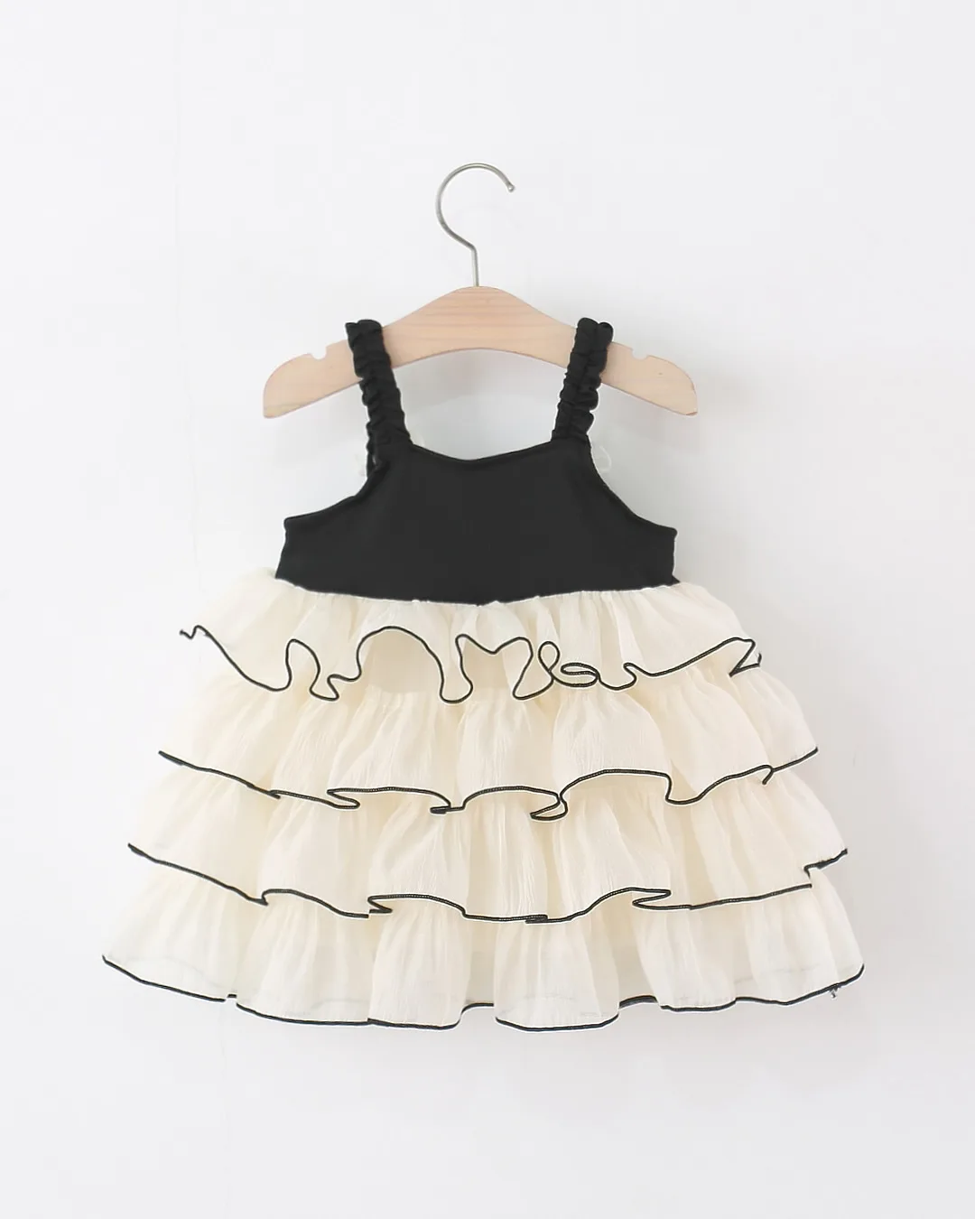 Βρεφικό φόρεμα μαύρο-κρεμ με βολάν - Image 2